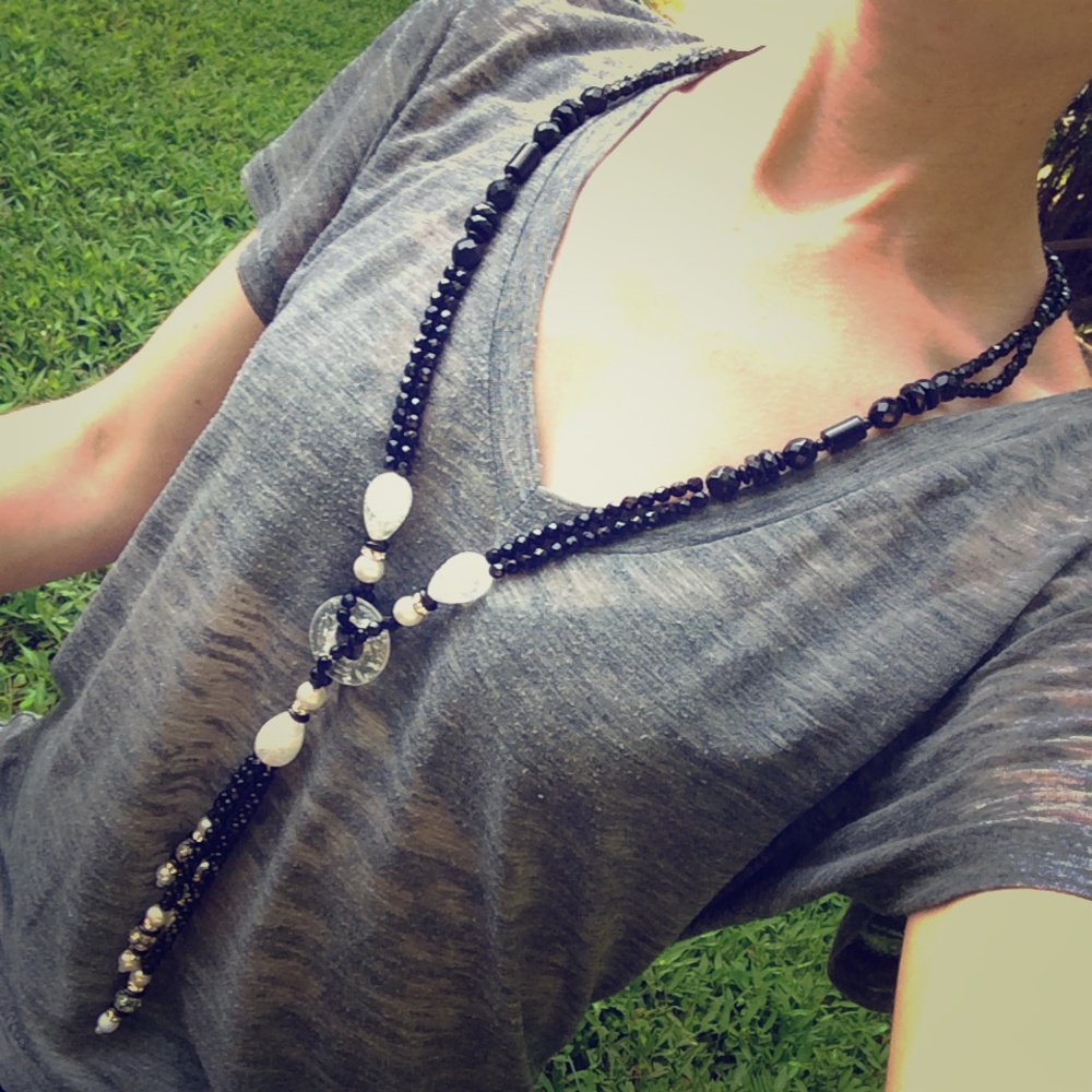 Vintage black and white speckled lucite Y necklace